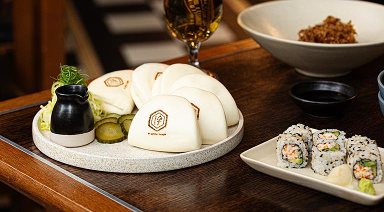 Duck leg bao buns with sushi