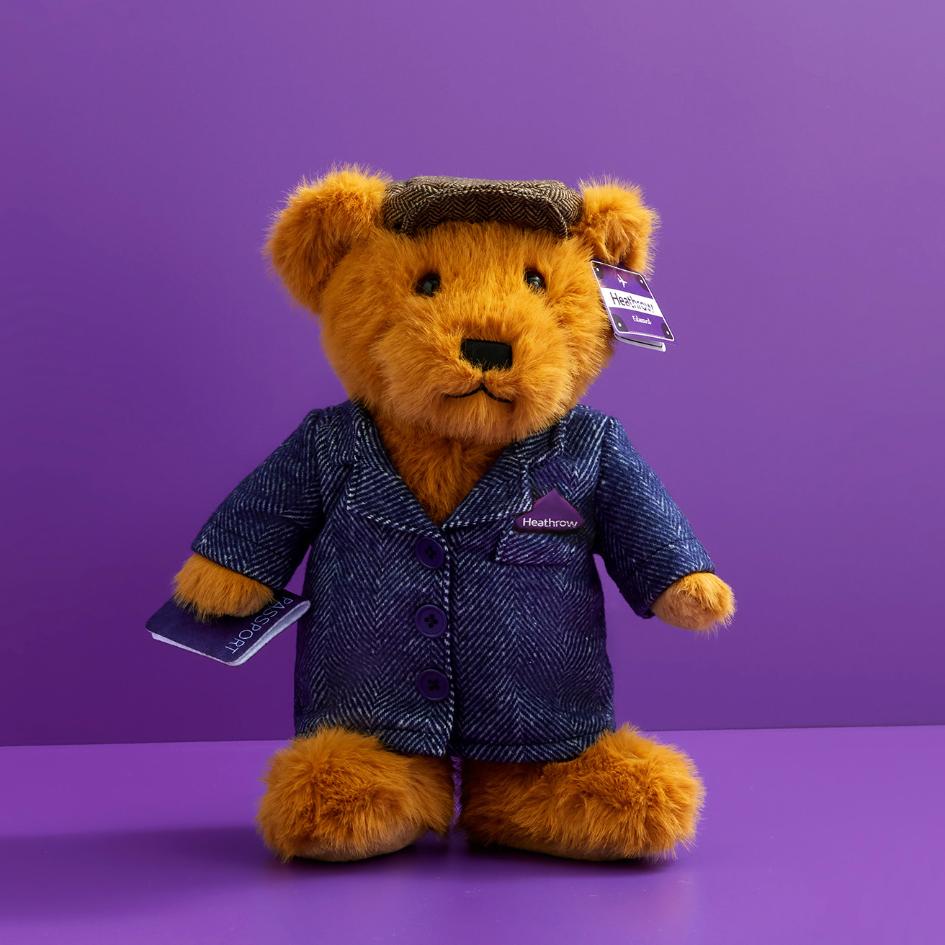 teddy bear wearing a denim jacket, available for purchase