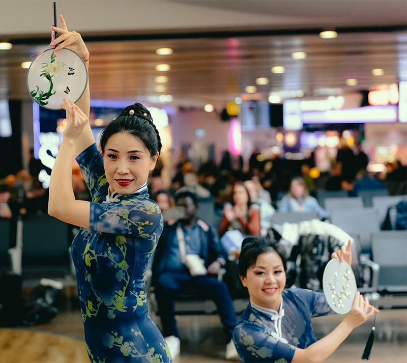 Fan Dancers – Take in the captivating movements and vibrant costumes.