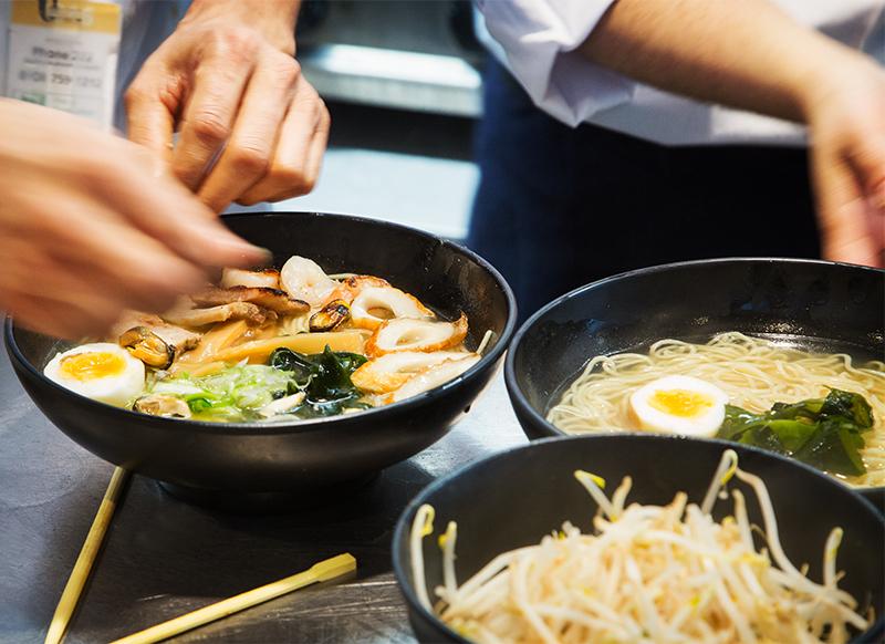 Wagamama dishes being prepared