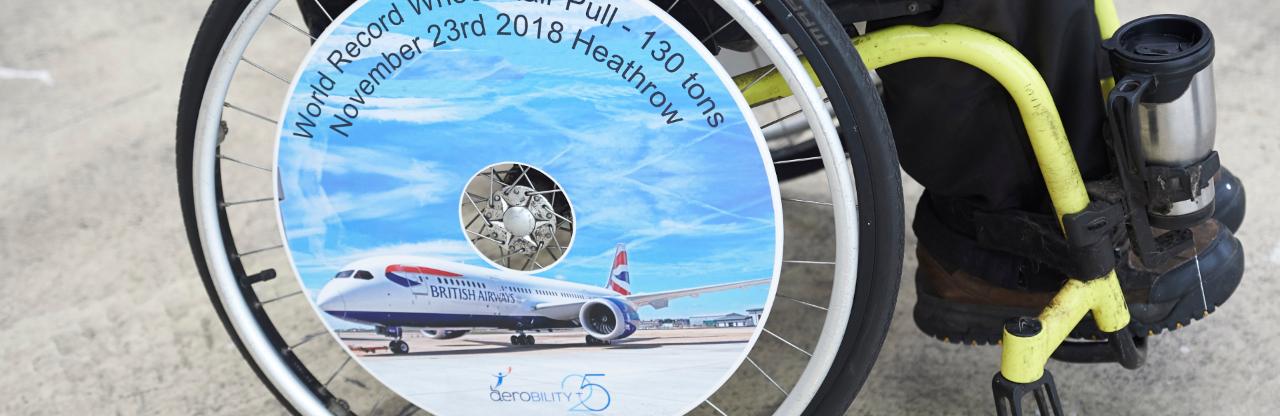 100 people in wheelchairs