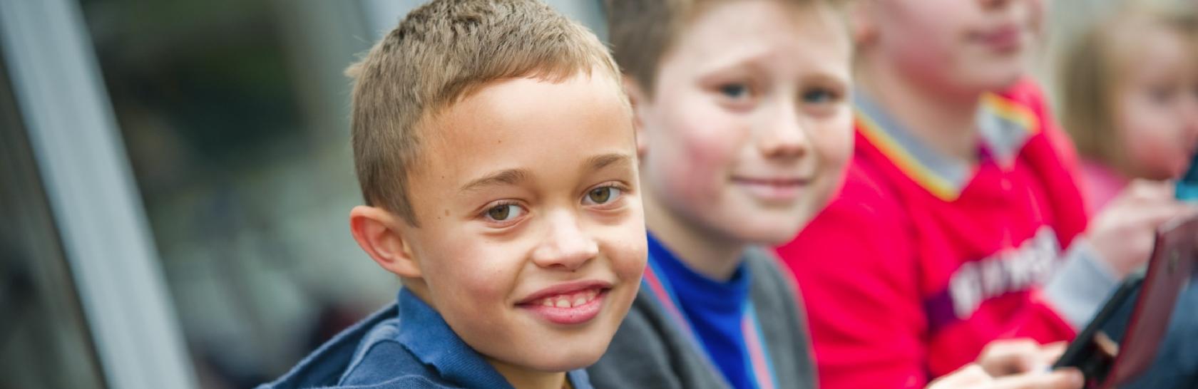 Children sitting down playing together