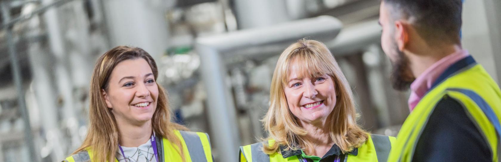 Team members talking to each other